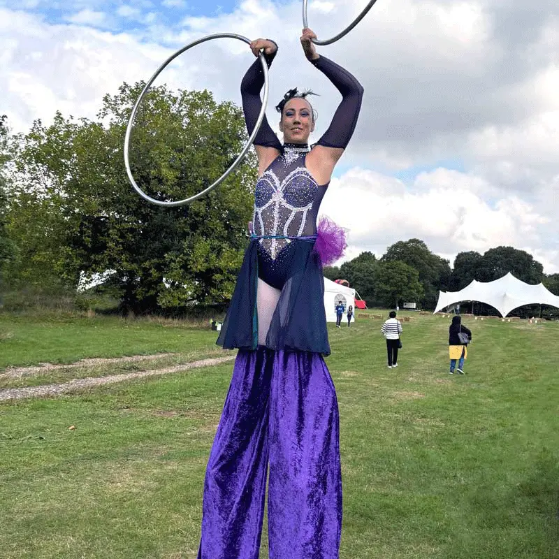 Blue Sky Fostering Family Fun Day 2024 - Lady on stilts