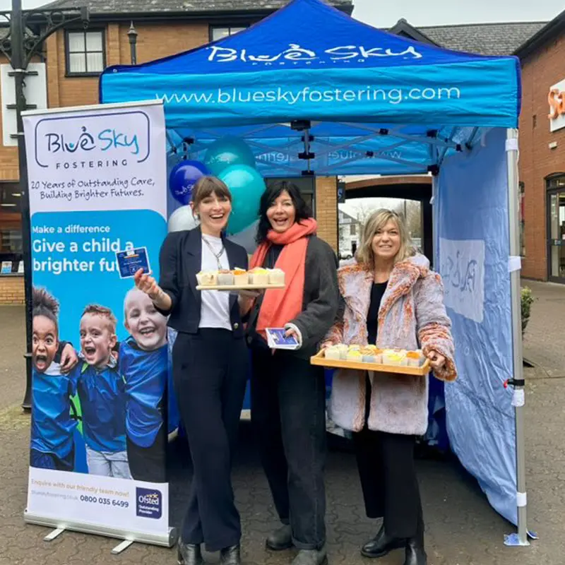 Royal Woottonn Bassett West Country Blue Sky Fostering hub handing out cakes