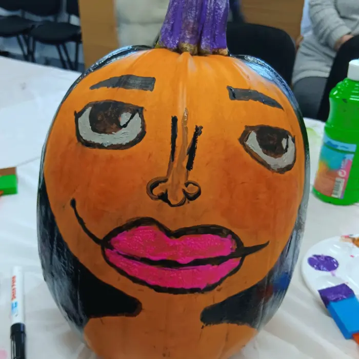 Pumpkin face - blue sky fostering pumpkin picking 2024 sussex and surrey